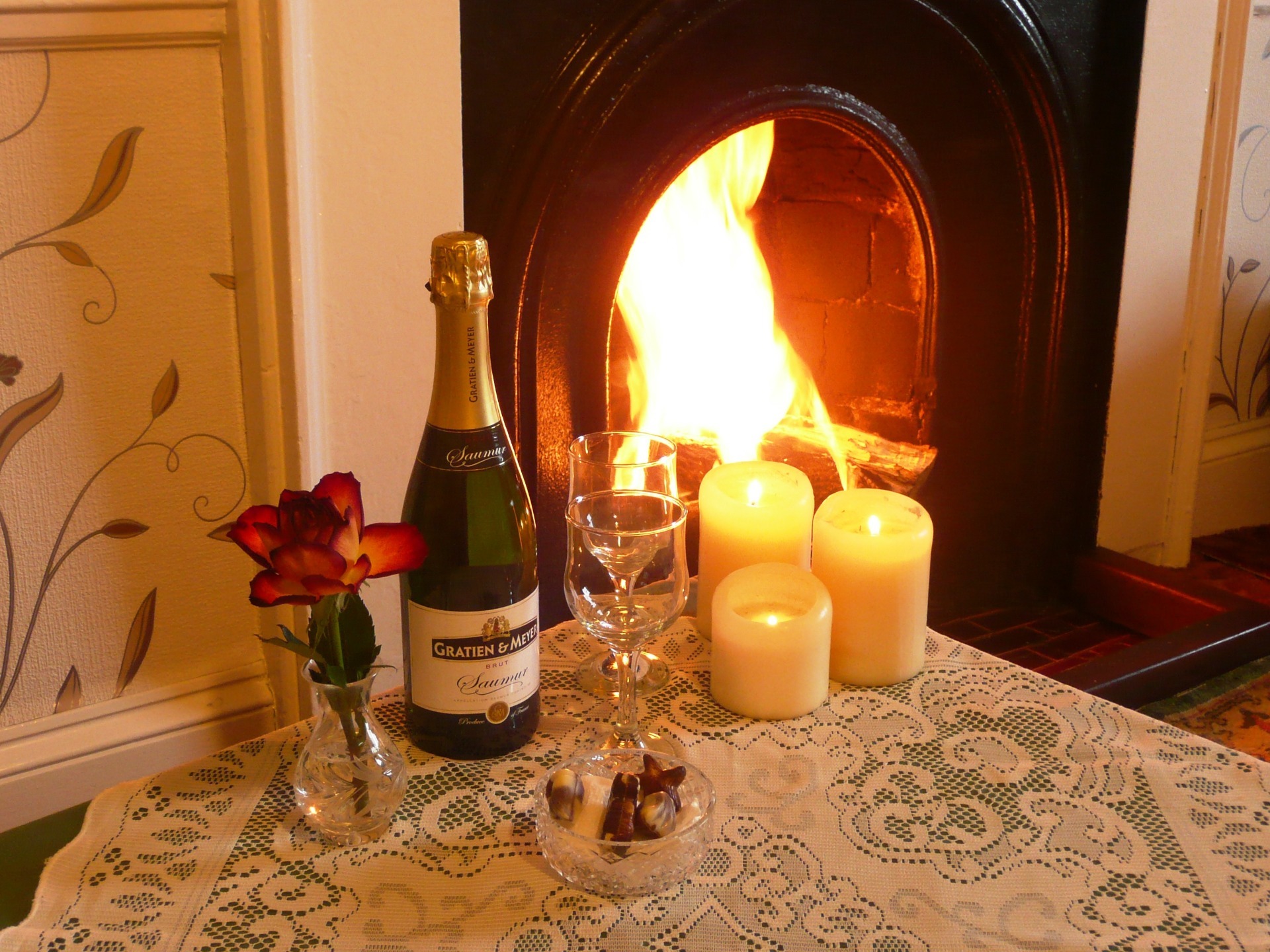 Champagne, candles and a roaring fire